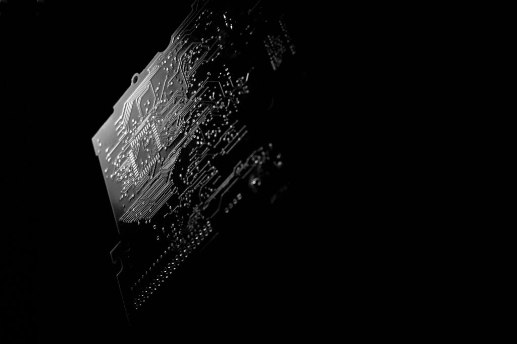 Stunning monochrome close-up of a PCB circuit board highlighting intricate details.